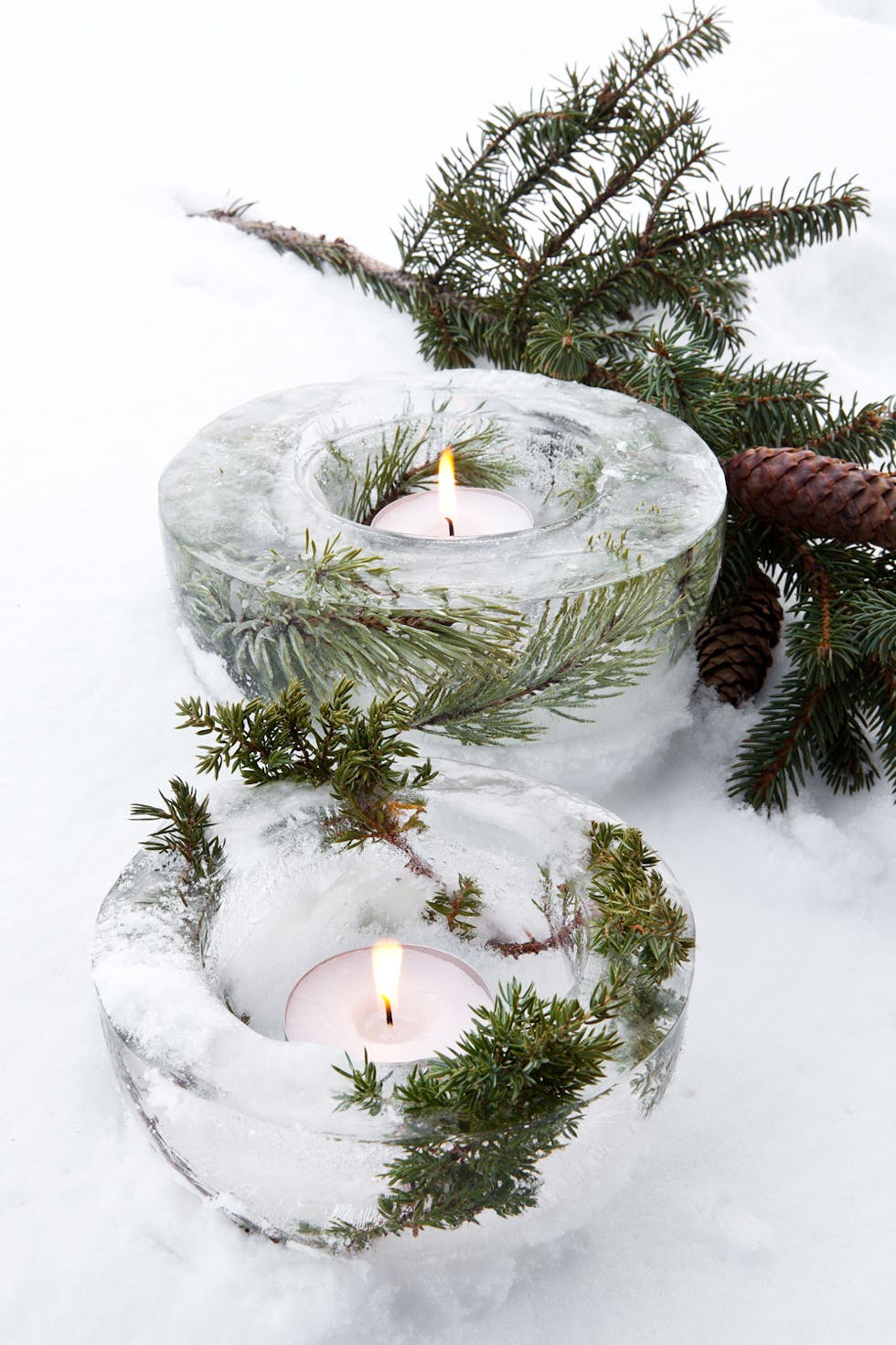 tea light candles in ice holders with leaves