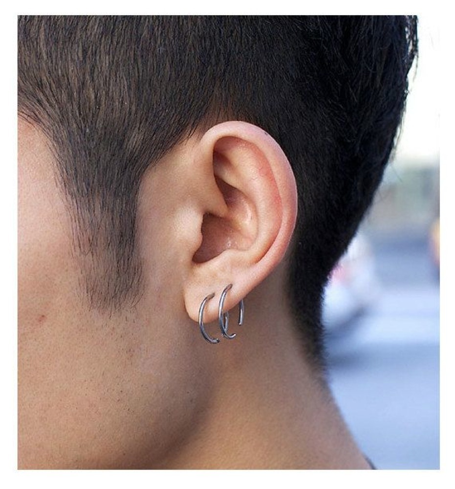 two earrings one ear man