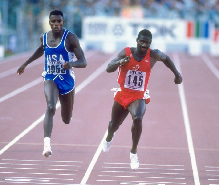 Rivaler Carl Lewis og Ben Johnson side om side