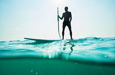 Stand up paddling SUP action-fotografi