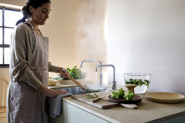 Laat geen onnodig (warm) water meer lopen. quooker bespaarcheck scandinavische groene keuken